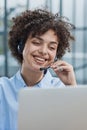 girl in a modern office working in a call center smiling Royalty Free Stock Photo