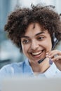 girl in a modern office working in a call center smiling Royalty Free Stock Photo