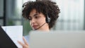 girl in a modern office working in a call center smiling Royalty Free Stock Photo