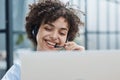 girl in a modern office working in a call center smiling Royalty Free Stock Photo