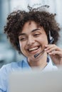 girl in a modern office working in a call center smiling Royalty Free Stock Photo