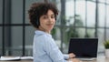 girl in a modern office working in a call center smiling Royalty Free Stock Photo