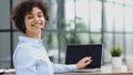 girl in a modern office working in a call center smiling Royalty Free Stock Photo