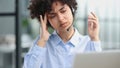 girl in a modern office working in a call center smiling Royalty Free Stock Photo