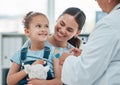 Girl, mom and doctor with vaccine injection, cotton ball and flu shot on arm for disease or covid prevention in hospital