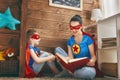 Girl and mom in Superhero costume Royalty Free Stock Photo