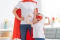 Girl and mom in Superhero costume Royalty Free Stock Photo