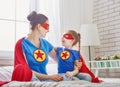 Girl and mom in Superhero costume Royalty Free Stock Photo