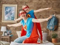 Girl and mom in Superhero costume Royalty Free Stock Photo