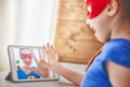 Girl and mom in Superhero costumes Royalty Free Stock Photo