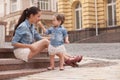 Girl and mother have fun with ice cream