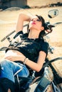 Girl on motorbike Royalty Free Stock Photo