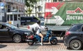 Girl on a motorcycle rides in a traffic jam on Volodymyrska Street