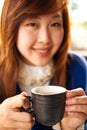 Girl and mug of tea