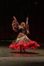 A girl in a national dress dances a gypsy dance Royalty Free Stock Photo