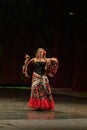 A girl in a national dress dances a gypsy dance Royalty Free Stock Photo