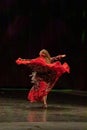A girl in a national dress dances a gypsy dance Royalty Free Stock Photo
