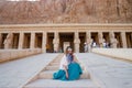 The girl near the ancient temple in Luxor, Egypt