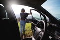 Girl near the car Royalty Free Stock Photo