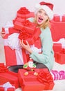 Girl near christmas tree happy celebrate holiday. Woman excited blonde hold gift box with bow. Perfect gift for Royalty Free Stock Photo