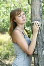 Girl near the tree Royalty Free Stock Photo