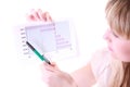 Girl with negative chart Royalty Free Stock Photo