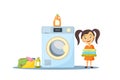 A girl next to a washing machine picks up clean clothes. Vector cartoon illustration