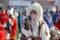 A girl of the Northern Nenets people in traditional fur clothes