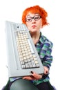 Girl with an old keyboard Royalty Free Stock Photo