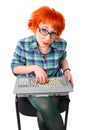 Girl with an old keyboard Royalty Free Stock Photo