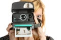 Girl with old point and shoot instant camera Royalty Free Stock Photo