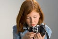 Girl with old SLR photo camera Royalty Free Stock Photo