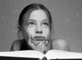 Girl with an open book Royalty Free Stock Photo