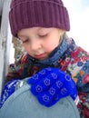 Girl opening mailbox in Winter