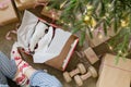 Girl opening presents on Christmas morning. Christmas gift