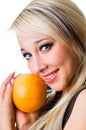 The girl with an orange close up Royalty Free Stock Photo