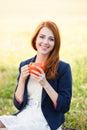 Girl with orange cup Royalty Free Stock Photo