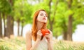 Girl with orange cup Royalty Free Stock Photo