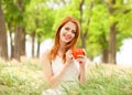 Girl with orange cup Royalty Free Stock Photo