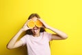 Girl with orange fruit