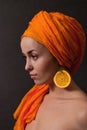 Girl with orange headscarf