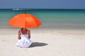 Girl with an orange umbrella