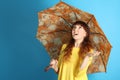 Girl with an orange umbrella Royalty Free Stock Photo