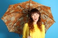 Girl with an orange umbrella Royalty Free Stock Photo
