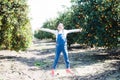 Girl and oranges, girl picks oranges, fruit orange grove, organic farm, Israel Royalty Free Stock Photo