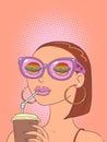 A girl in original glasses drinks a drink and thinks about buying. Potential consumer of a service or offer.