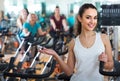 Girl and other females working out in sport club Royalty Free Stock Photo