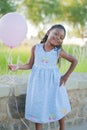 Girl Outdoors With Pink Balloon