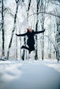 Girl outdors in the forest and jump