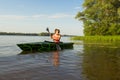 Girl with paddle and kayak Royalty Free Stock Photo